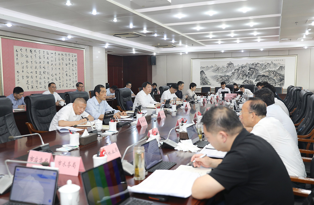 张君毅党组会.jpg